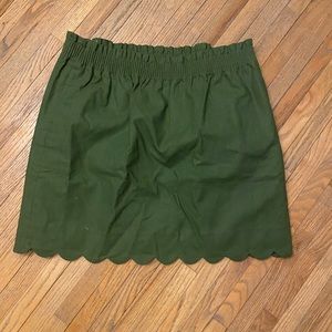 J. Crew shorter scalloped olive green skirt. NWT Size 14. Stretchy waistband.